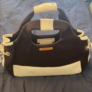 kate spade Brown and white purse with dust jacket